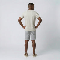 Camiseta com Gola Transpassada e Bolso